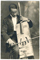 Man In A Suit Playing Cigar Box Cello